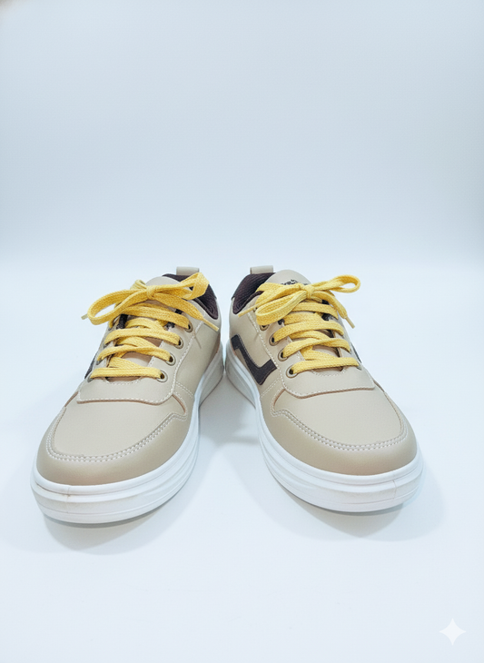 Men's casual sneakers beige color withe yellow laces and a white sole.