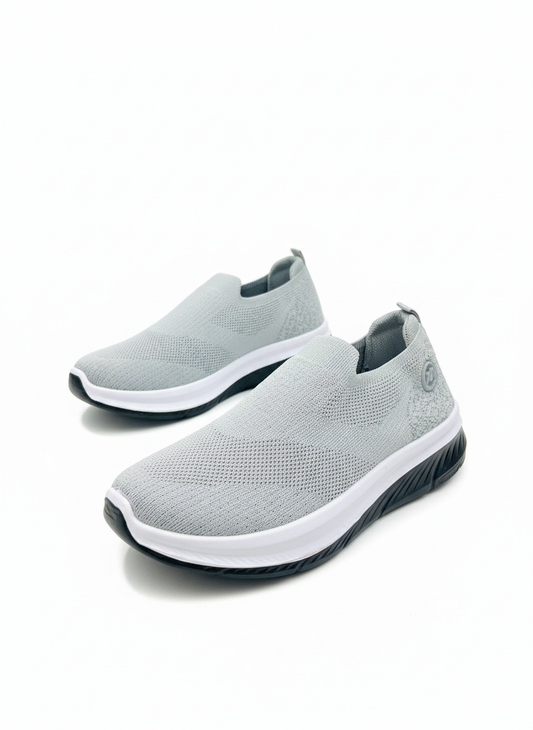 Men's Skecher light grey color with white and black sole